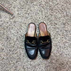 Gucci Black Leather Mules with Gold Accents